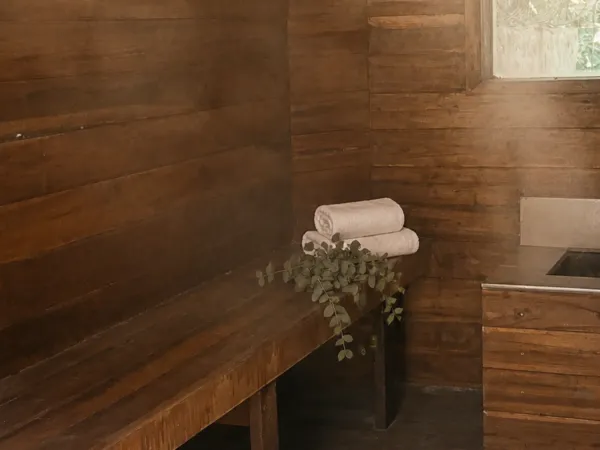 Exterior view of the wooden sauna building