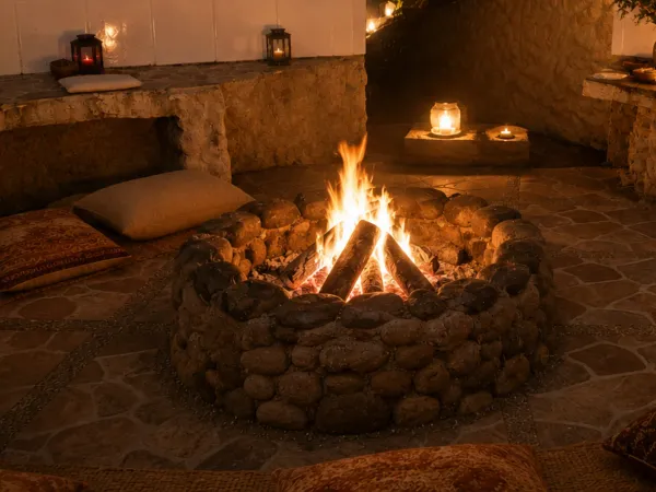 Night bonfire lit on the path
